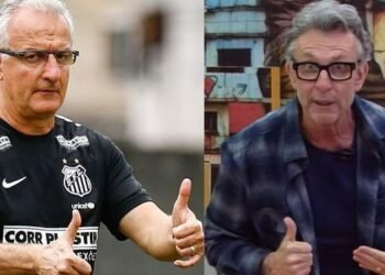 Craque Neto aponta novo nome para o Corinthians, longe de Dorival 40 Duas pessoas lado a lado fazendo o sinal de positivo, uma veste uniforme de time, outra usa óculos e camisa xadrez.