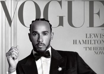 Hamilton brilha na capa da Vogue antes do Met Gala 2023 33 Revista com destaque para Lewis Hamilton em capa elegante, usando terno sofisticado, projetando confiança e estilo.